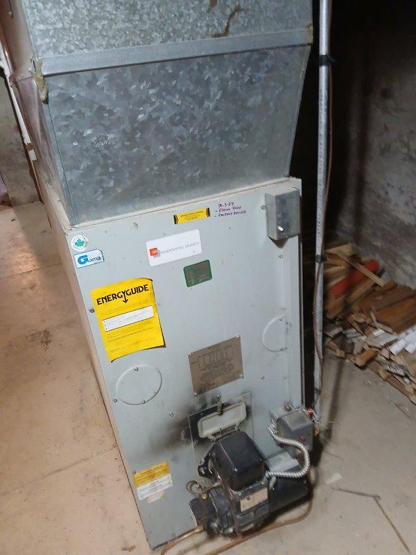 Responded to no-heat call for 20+ year old furnace where fan was operating but unit failed to ignite. Diagnostic testing revealed a failed ignition transformer. Replaced ignition transformer with customer approval and verified proper system operation through test cycling. Furnace now ignites normally and is functioning correctly.