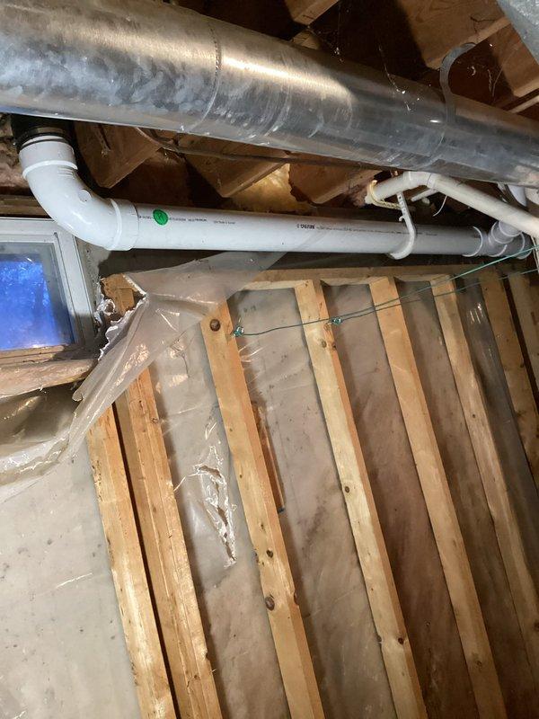 Completed replacement of 4" cast iron main stack for powder bathroom with PVC piping. Service included removal of deteriorated cast iron piping from main stack to floor level at toilet and main vent/lavatory drain. Successfully installed new PVC drainage system throughout the affected area, secured within structural framework, and reset existing toilet to complete the repair.