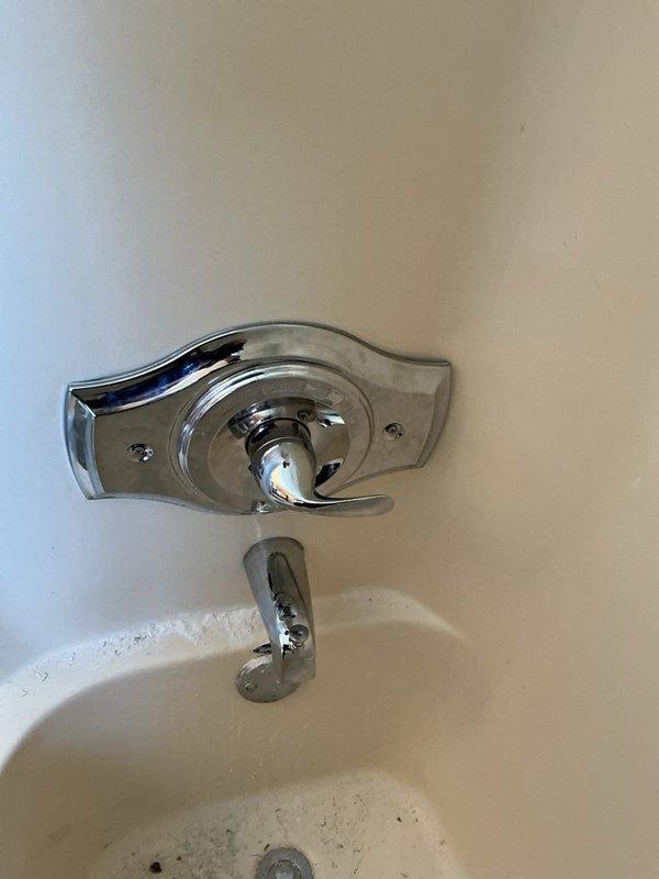 Completed installation of a Moen T2133/2520 Brushed Nickel tub shower valve, spout and shower head. Removed existing shower valve components and replaced with new system featuring LifeShine® finish and lever handle control. Verified proper operation after installation.