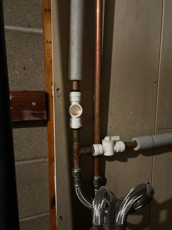 Responded to emergency call for burst pipe in basement. Located broken fitting that caused water leak, requiring city water shutoff. Repaired damaged pipe section by replacing defective fitting and reconnecting copper and PVC components to restore proper water flow and system integrity.