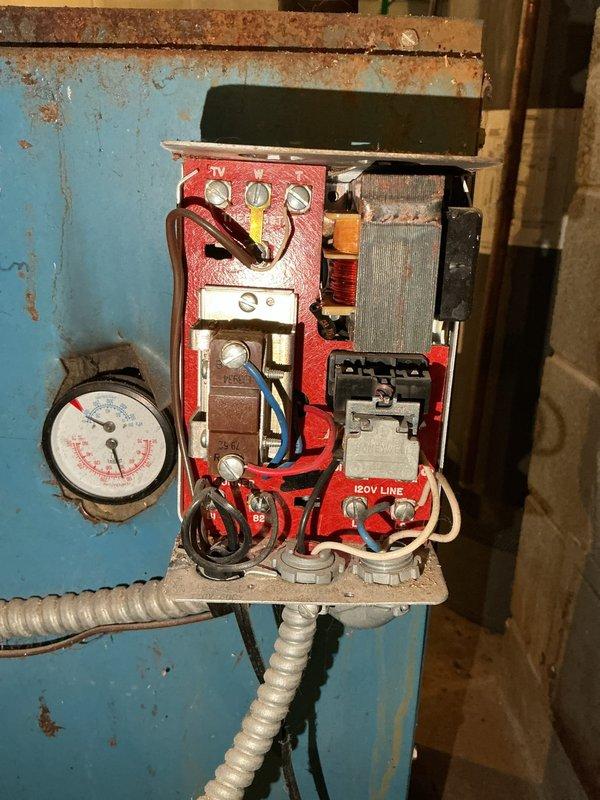 Completed replacement of faulty Aquastat relay on customer's boiler system. Properly set temperature threshold to 180 degrees and verified full system functionality. Boiler is now operating correctly with all safety controls functioning as designed.