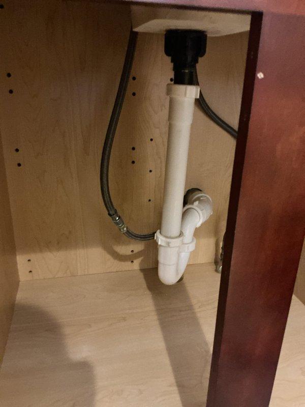 Responded to service request for leaky bathroom faucet issue. Diagnosed faulty cartridge as the source of the leak. Presented customer with options to either replace the cartridge or install new faucet fixtures. Customer opted for complete replacement; installed new polished chrome faucet with dual lever handles on existing vanity sink.