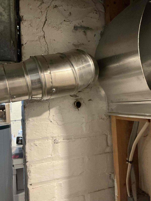 Diagnosed Luxaire furnace (22 years old) exhibiting no heat condition with board flashing error code for open high limit switch. Successfully restored function by resetting stuck limit switch, but noted it will likely fail again soon. Inspection revealed severely degraded igniter that remains operational for now. Verified heat exchanger integrity with no cracks or damage found. Recommended replacement of high limit switch and igniter to prevent future no-heat conditions. All other components tested and functioning properly.