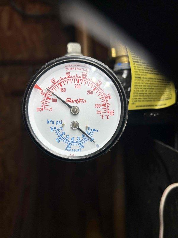 Responded to customer complaint of boiler leakage. Identified cause as inadvertently open fast fill valve causing system overpressurization to 30psi. Closed valve, verified expansion tank pressure at 12psi, and monitored system for 20 minutes to confirm proper operation and resolution of relief valve dripping.