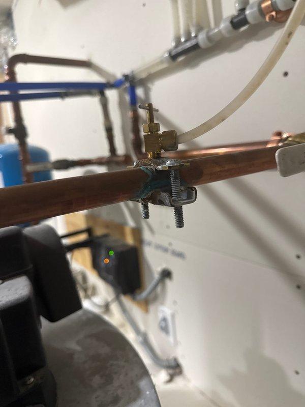 Responded to service call for continuously running humidifier. Diagnosed improper wiring where low voltage was connected directly to outlet instead of furnace control board. Rewired humidifier to integrate with heating system so unit now operates correctly only when heat is called for. Noted suboptimal humidifier ductwork installation that may need attention in future service.