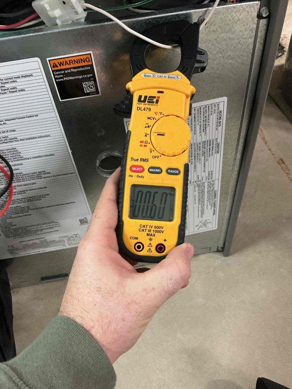 Responded to warranty call for 2-year-old Lennox furnace displaying error code 270 (no flame current sensed). Inspected grounds, removed and cleaned flame sensor, then tested to confirm strong reading. System now operating correctly with all components in good condition. Recommended annual pre-season maintenance to clean flame sensor and prevent similar issues.