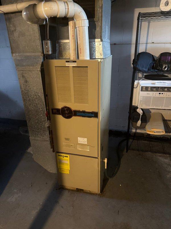 Performed scheduled tune-up on 1991 Comfortmaker furnace. Diagnostic testing with Testo 310M analyzer revealed significant efficiency concerns (89.2% efficiency, 326 ppm CO, 818 ppm CO AF). Identified severely rusted burners causing short cycling, heat spots on heat exchanger, and overall combustion issues consistent with the unit's age. Replacement system was previously quoted to customer.
