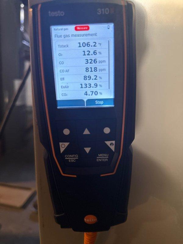 Performed scheduled tune-up on 1991 Comfortmaker furnace. Diagnostic testing with Testo 310M analyzer revealed significant efficiency concerns (89.2% efficiency, 326 ppm CO, 818 ppm CO AF). Identified severely rusted burners causing short cycling, heat spots on heat exchanger, and overall combustion issues consistent with the unit's age. Replacement system was previously quoted to customer.