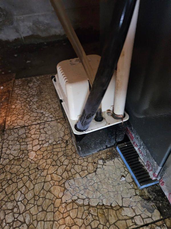 Responded to emergency call for basement flooding caused by failed condensate pump. Replaced defective pump with new unit from inventory. Identified broken humidifier damper as secondary issue which was causing continuous humidifier operation and contributing to excessive water accumulation in basement.