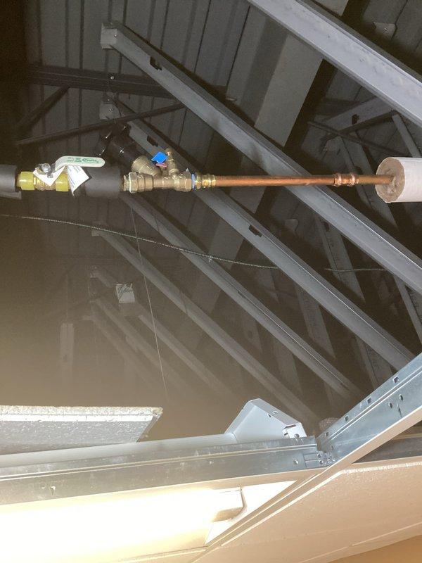 Repaired a failed fitting connection on an actively leaking PEX recirculating line in ceiling of patient area. Investigation revealed the PEX line was sagging excessively at the copper connection point, causing the fitting failure. Replaced damaged section of piping and properly remounted the PEX line with adequate support to prevent future sagging and ensure system integrity.