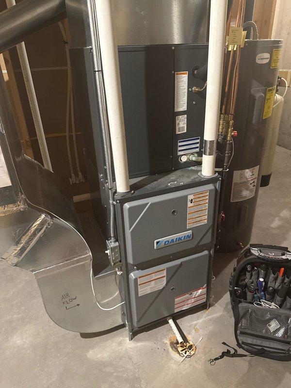 Performed routine maintenance on 10-year-old Daikin forced air furnace system. Inspected combustion chamber confirming safe operation, cleaned filter, verified secure electrical connections throughout system, and checked blower assembly functionality. Customer enrolled in preventative maintenance membership program after system was confirmed to be in good working condition.