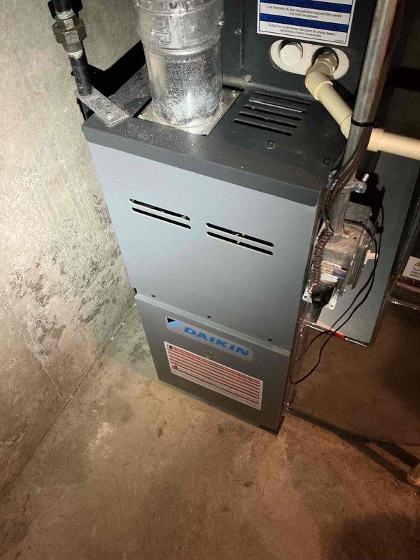 Responded to customer complaint of formaldehyde-like odor emanating from 9-year-old Daikin furnace. Conducted comprehensive diagnostic inspection including examination of burners, heat exchanger (internal and external), and exhaust stack. No unusual odors were detected during visit and all components were found to be functioning properly. Air filter was clean and system operation was normal. No service adjustments or repairs were necessary.