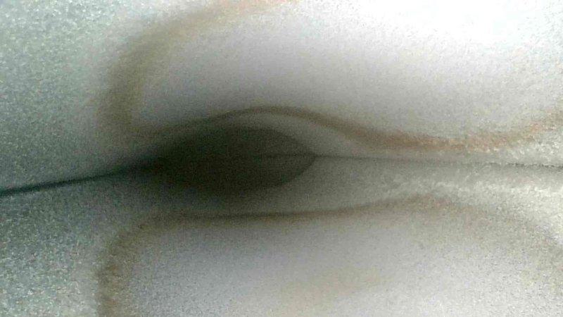 Responded to no-heat call for 15-year-old Bryant natural gas furnace. Diagnostic inspection revealed gas valve was inadvertently shut off, which was promptly restored to operational position. Visual inspection of heat exchanger showed no visible cracks or holes, though replacement recommendation was noted due to equipment age. System returned to normal operation.