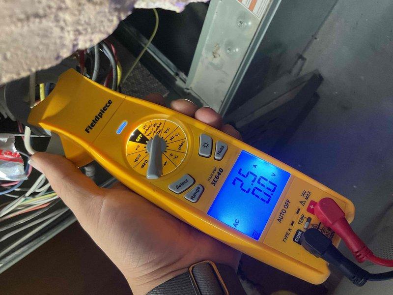 Performed tune-up service on 14-year-old furnace. System operational but required maintenance including filter replacement due to dirt accumulation. Identified and documented stripped gas valve. Electrical testing showed readings within normal range at 25.7V. Recommended monthly filter changes to client.