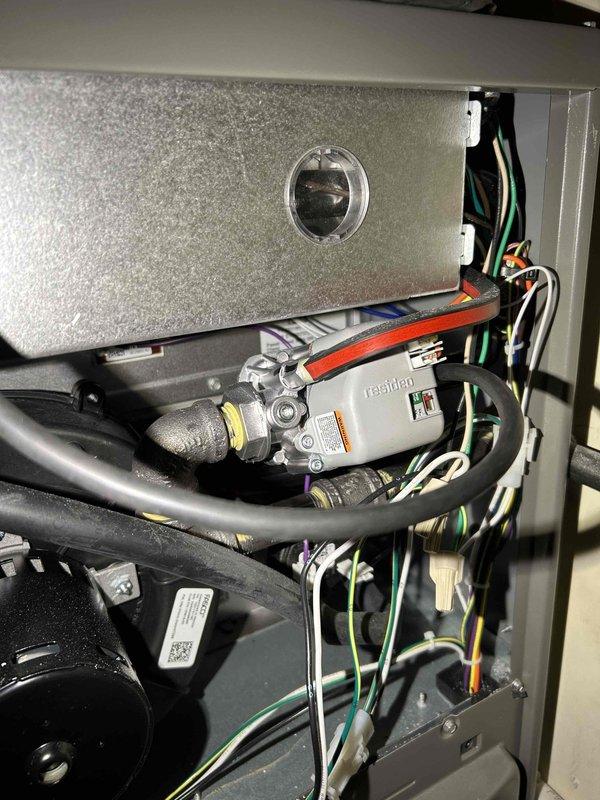 Performed scheduled FRP tune-up on 1-year-old furnace. Adjusted gas train pressure from 3.77 inWC to 3.41 inWC, cleared condensate drain line and trap of debris/spiderwebbing. Combustion analysis showed CO at 13 ppm. Verified proper operation of inducer motor, capacitor, pressure switch, control board connections, and thermostat. Noted moderate filter condition; recommended replacement every 3 months. System functioning normally with no immediate concerns.