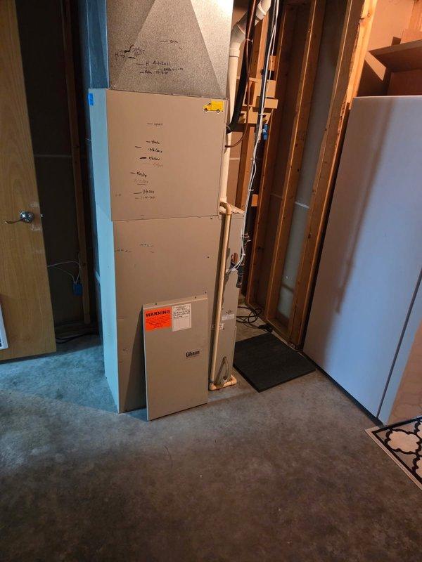 Diagnosed 23-year-old Gibson furnace with intermittent ignition failure issues. Customer had previously replaced blower motor and igniter with continued operation problems. Observed unit shutting down prematurely twice during inspection, noted excessively noisy combustion blower and faulty pressure switch requiring replacement. Control board also suspected of malfunction, consistent with known issues in this model.