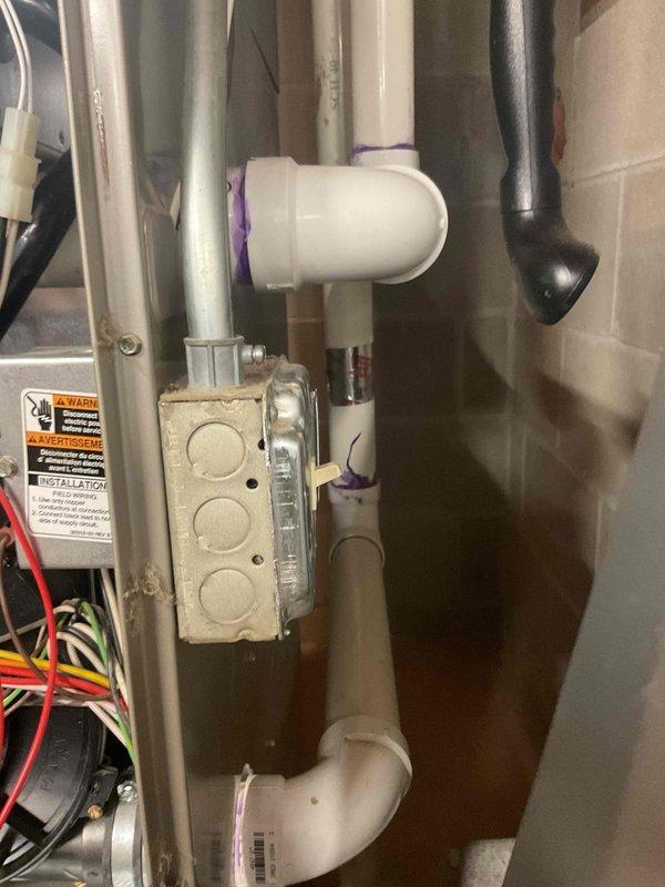 Serviced 15-year-old forced air furnace that was shutting down due to limit switch activation. Diagnostic inspection revealed clogged secondary heat exchanger with visible corrosion and buildup on the heat exchanger fins. Replaced secondary heat exchanger to resolve high CO issue and restore normal system operation.