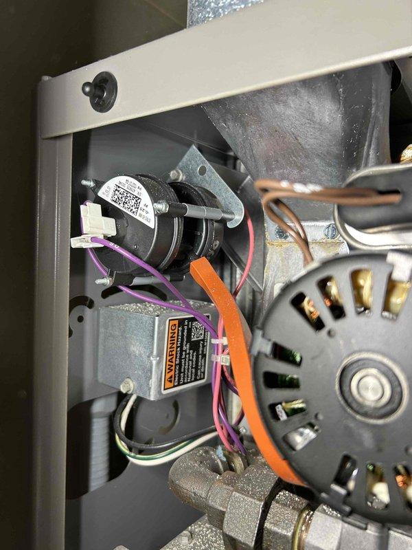 Performed annual tune-up on 4-year-old FRP furnace with comprehensive inspection including heat exchanger, combustion analysis, gas pressure verification (high and low stage), flame sensor, and burner assessment. Cleaned pressure switch and inspected blower motor assembly. System is operating normally with no immediate concerns identified. Thermostat functioning properly with adequate heating performance.