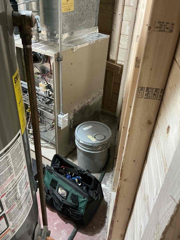 Performed diagnostic inspection on 25+ year old furnace exhibiting short cycling symptoms. Examined flame pattern, internal components, and heat exchanger. Determined unit is oversized for space contributing to operational inefficiency. Recommended replacement rather than repair due to age and condition of equipment.