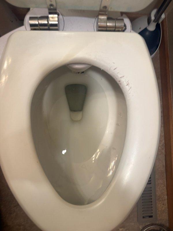Replaced non-functional kitchen faucet with new American Standard single-handle model featuring modern design and functional sprayer. Also inspected toilet for potential issues as requested by customer. Both fixtures now operating properly with no leaks.