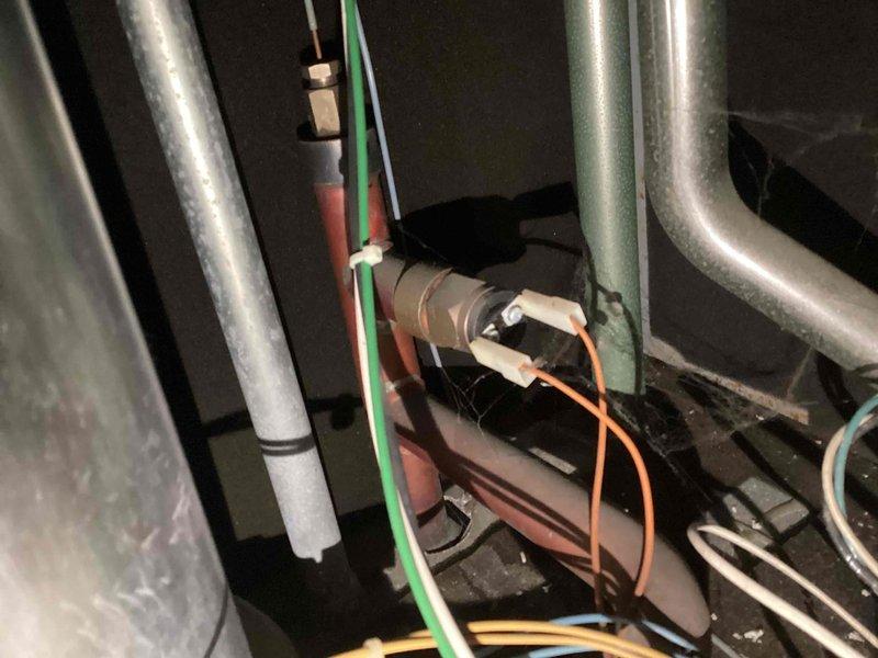 Diagnosed and resolved low pressure fault on Triangle Tube boiler system that was causing no heat condition. System pressure was at 15psi; reset equipment successfully which restored operation. Educated customer on reset procedure for potential future occurrences and discussed limited parts availability options due to Triangle Tube no longer operating in US market.