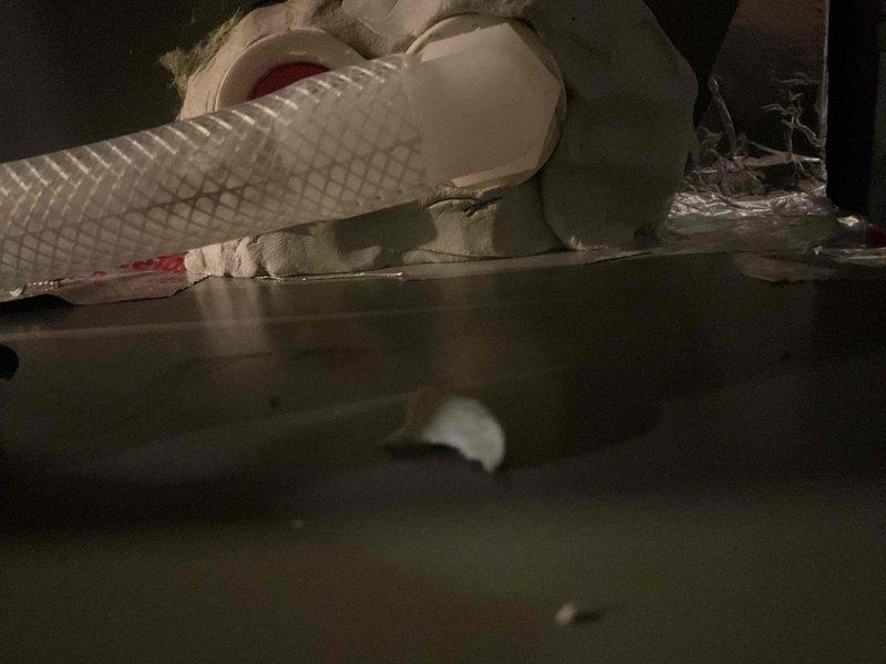 Completed warranty service involving sealing of exterior HVAC penetrations. Resealed line set at A-coil connection point and exhaust penetrations to prevent air leakage. Documented repair areas with photographs for verification purposes.