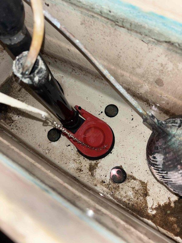 Replaced defective flapper in ADA toilet that was experiencing filling issues and leaking. Installed new Korki flapper to restore proper function on this aging fixture, which had been in service for approximately 50 years.