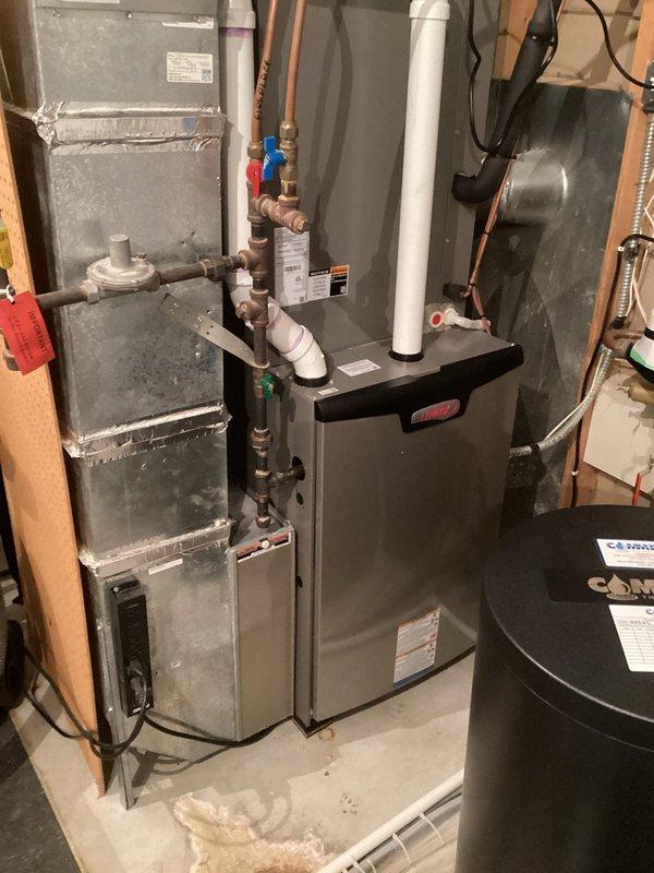 Responded to service call regarding humidifier performance issues and thermostat connectivity problems. Determined humidifier was not operating properly due to incorrect settings; adjusted to maximum setting to accommodate drier climate conditions. Replaced non-functioning Lennox S40 Smart Thermostat that had lost WiFi connectivity and could not be reset. System now in normal operation with restored functionality.