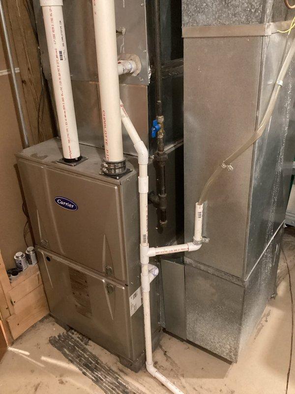 Diagnosed and repaired a 5-year-old Carrier gas furnace with no heat complaint. Found 24V present at gas valve but valve not opening. Replaced defective gas valve, verified proper ignition sequence, and confirmed system operation with 60°F temperature rise.