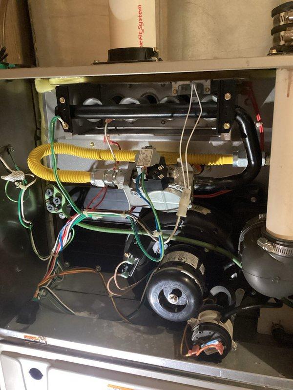 Diagnosed and repaired a 5-year-old Carrier gas furnace with no heat complaint. Found 24V present at gas valve but valve not opening. Replaced defective gas valve, verified proper ignition sequence, and confirmed system operation with 60°F temperature rise.