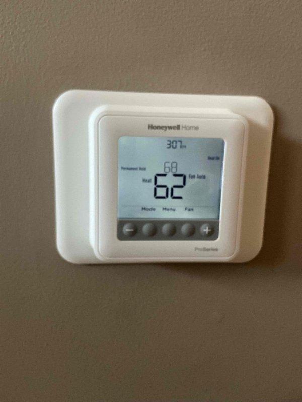 Responded to service call for Bryant furnace with no heat. Diagnosed multiple issues: plugged filter from ultrasonic humidifier, faulty limit switch, and malfunctioning Honeywell thermostat. Replaced air filter with customer-provided filter, installed new thermostat, and advised customer to discontinue use of ultrasonic humidifier. System now operating properly.