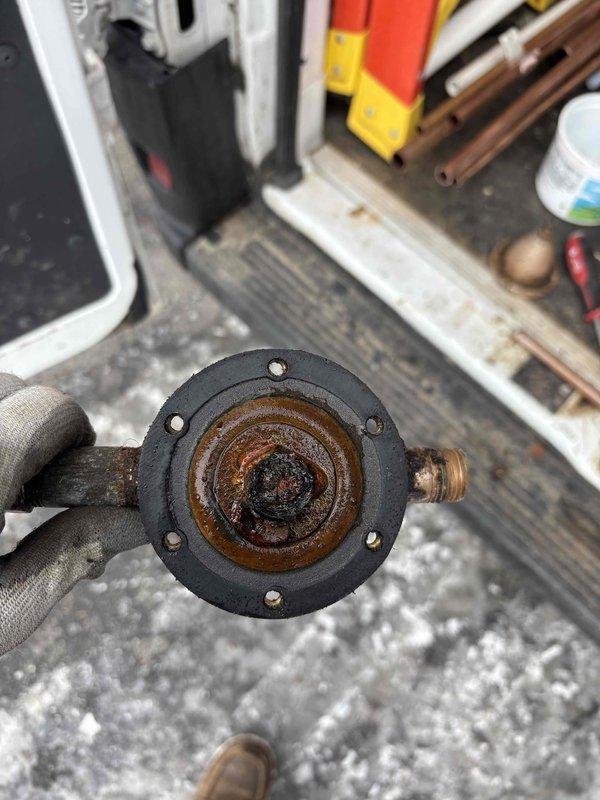 Responded to basement flooding caused by failed pressure relief valve (PRV). Diagnosed severely corroded internal components, removed defective PRV, and hard-piped connection to restore water service. Provided estimate for permanent PRV replacement and installation of leak detection shut-off valve downstream from water meter.