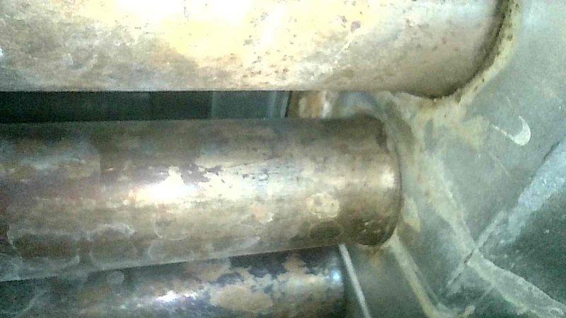 Completed annual maintenance on gas furnace per Family Rewards agreement. Inspection revealed early-stage scaling in heat exchanger, documented with photos for baseline comparison. Previously identified water leak area was also photo-documented to monitor progression. All systems functioning properly with no operational issues noted at this time.