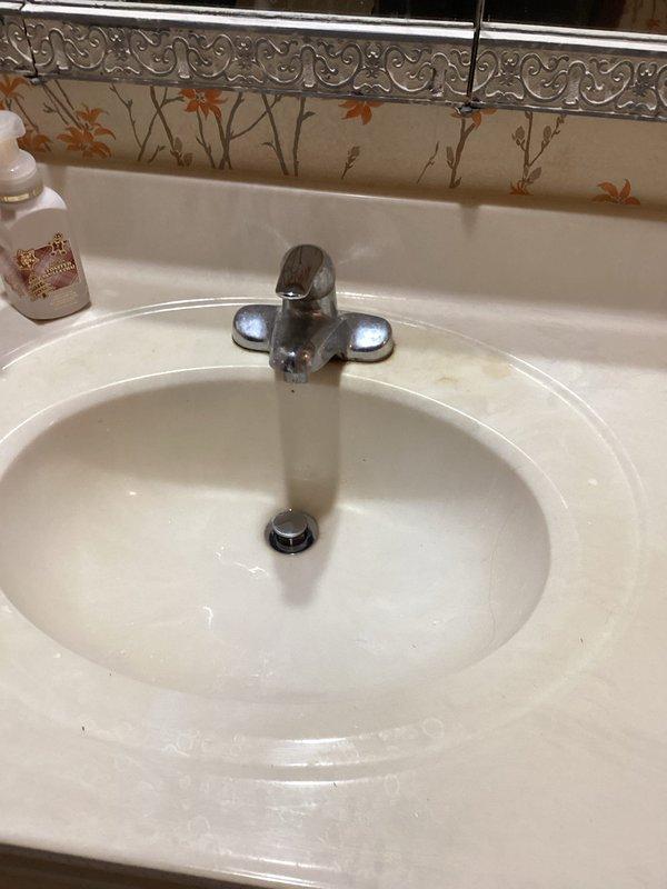 Completed diagnostic inspection of upstairs bathroom toilet with corroded internal components. Documented condition of toilet requiring full replacement of tank mechanisms due to extensive corrosion. Also assessed related bathroom fixtures including shower and sink with low water pressure issues and temperature regulation problems in shower. Additional inspection of refrigerator water line requiring insulation and water filtration system needing replacement.