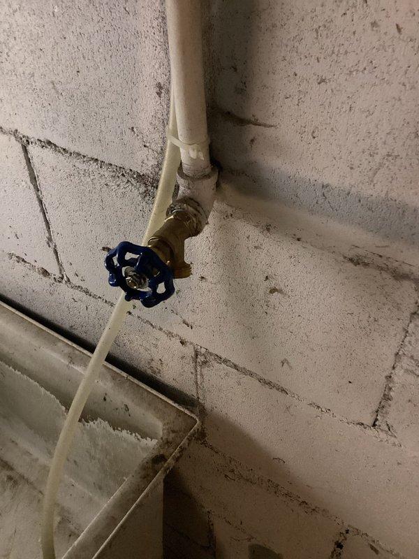 Diagnosed and replaced corroded boiler drain valve for washer that was leaking in basement. Installed new brass shutoff valve with PVC connections to restore proper water flow and eliminate leak.