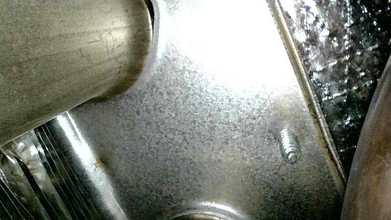 Responded to no-heat service call for LP furnace with non-functioning Nest thermostat. Found tripped rollout switch and heavily rusted burners causing flame irregularities. Reset switch, removed and cleaned burners, verified heat exchanger integrity, and installed new thermostat. Advised customer on future burner replacement due to extensive rust.