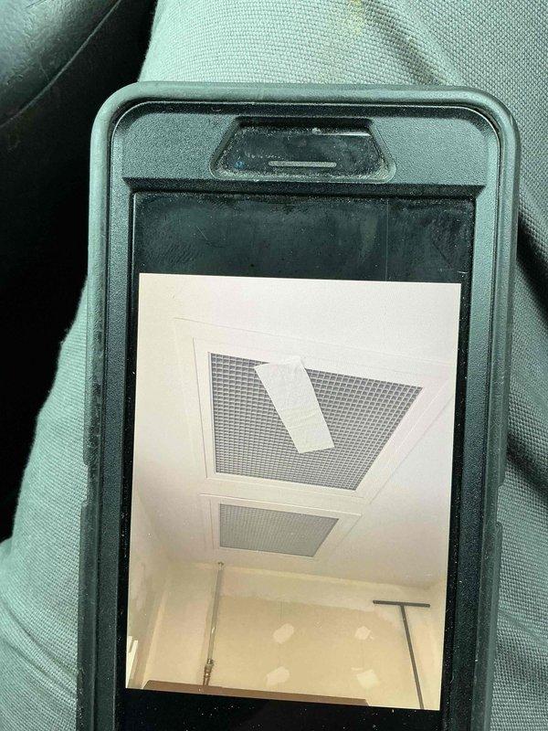 Diagnosed Bradford White water heater displaying code 16/61 due to combustion issues. Inspected ventilation system and determined inadequate air flow. Resolved by loosening burner assembly cover plate to improve combustion air intake, successfully restoring hot water function. Attempted new hood installation without success.