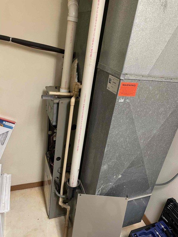 Responded to no heat complaint on 10+ year old furnace system (1996 model). Diagnostic inspection revealed non-functioning blower despite ignition occurring. Found burned out ignitor and identified significant crack in primary heat exchanger at the burner inlet underside. Due to safety concerns, tagged furnace as hazardous and recommended system replacement. Scheduled follow-up with service advisor for replacement options.