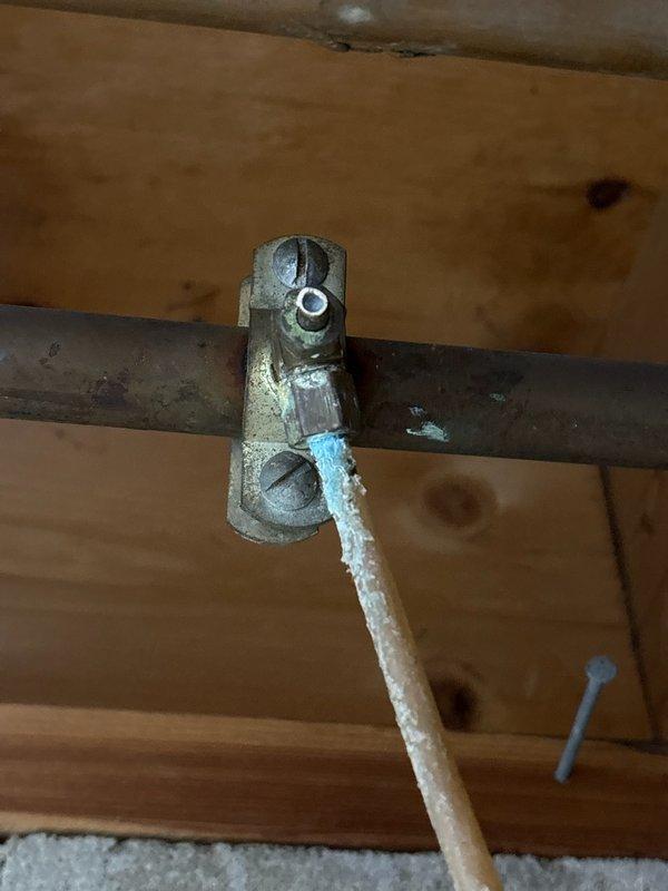 Responded to water leak from refrigerator line caused by malfunctioning saddle valve. Per customer's request, eliminated the valve completely as they no longer wanted water supplied to the refrigerator, thus preventing future leaks from the same source.