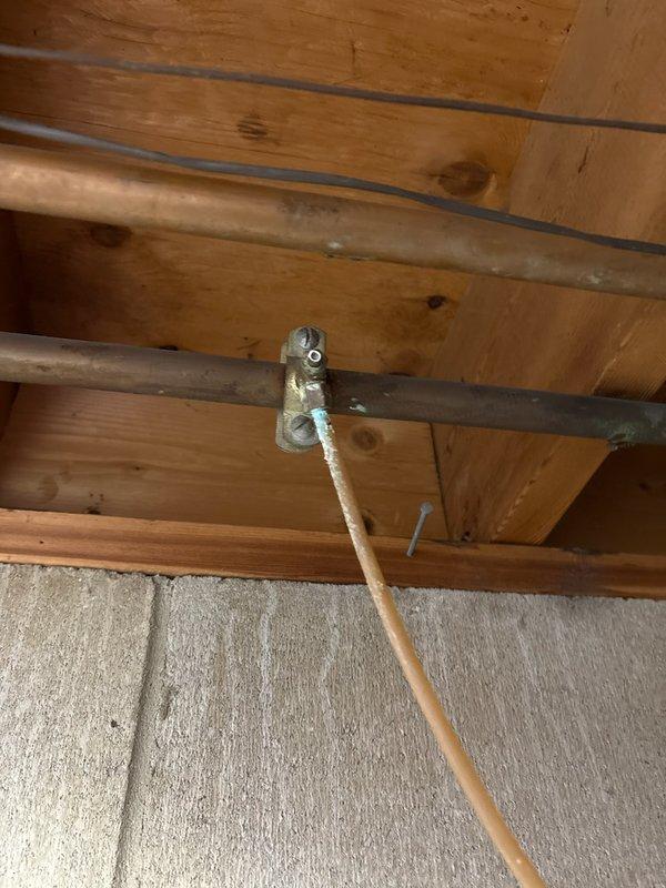 Responded to water leak from refrigerator line caused by malfunctioning saddle valve. Per customer's request, eliminated the valve completely as they no longer wanted water supplied to the refrigerator, thus preventing future leaks from the same source.
