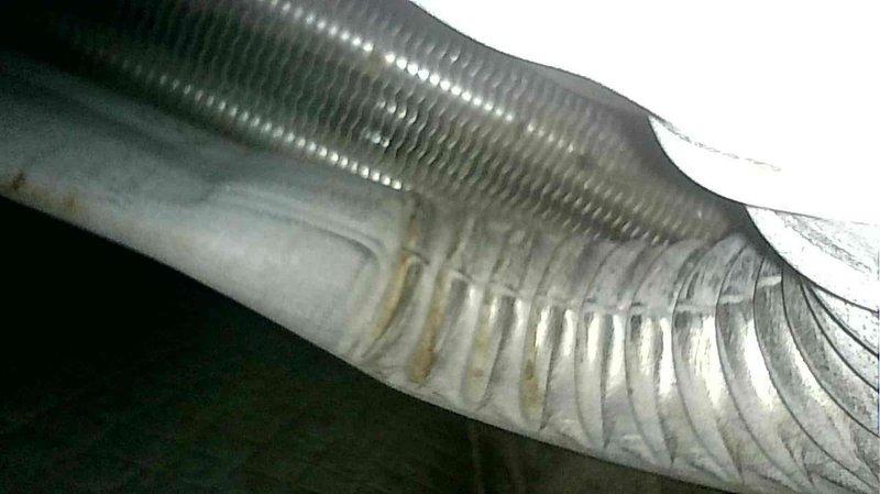 Performed scheduled furnace tune-up on gas unit of indeterminate age. Completed standard maintenance procedures including testing electrical components with multimeter (measured 4.96V). Identified high gas setting and made necessary adjustments to optimize combustion efficiency. Heat exchanger inspected and appears functional. Service completed as part of biannual maintenance agreement.