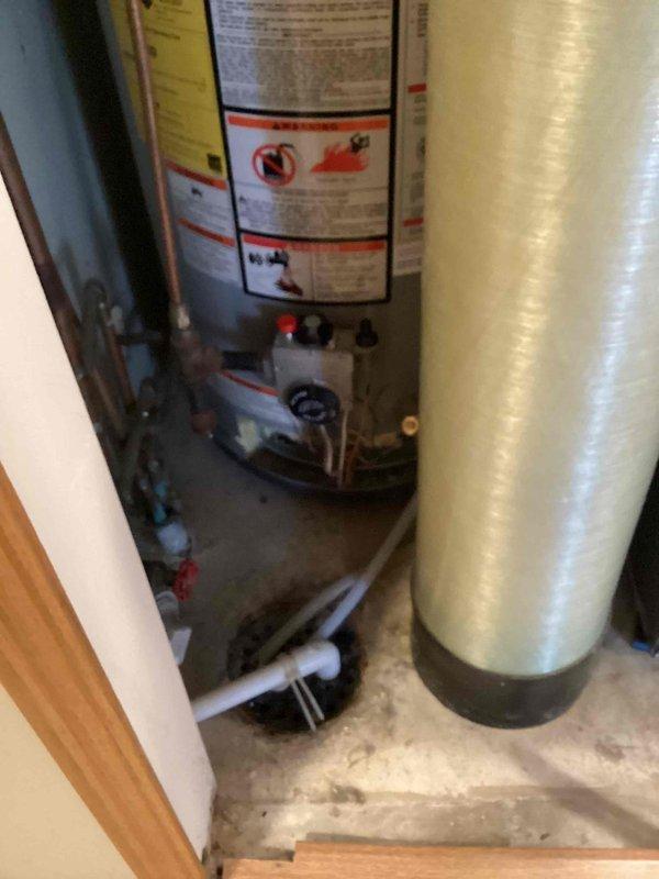 Responded to service call for tanked water heater with no hot water. Diagnosed faulty pilot assembly as the issue, as pilot would light during reset but would not remain lit. Inspected Rheem water heater system and surrounding components. Provided customer with options for repair or replacement of the unit.