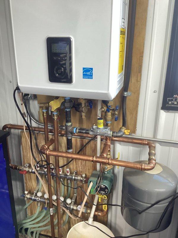 Installed new Meno gas regulator (1/2" or 3/4") and successfully converted system to 2-pound operation per approved estimate. Coordinated with gas company to verify proper pressures and added Maxis control regulator to boiler with appropriate pressure settings. All systems verified operational with correct gas pressure parameters.