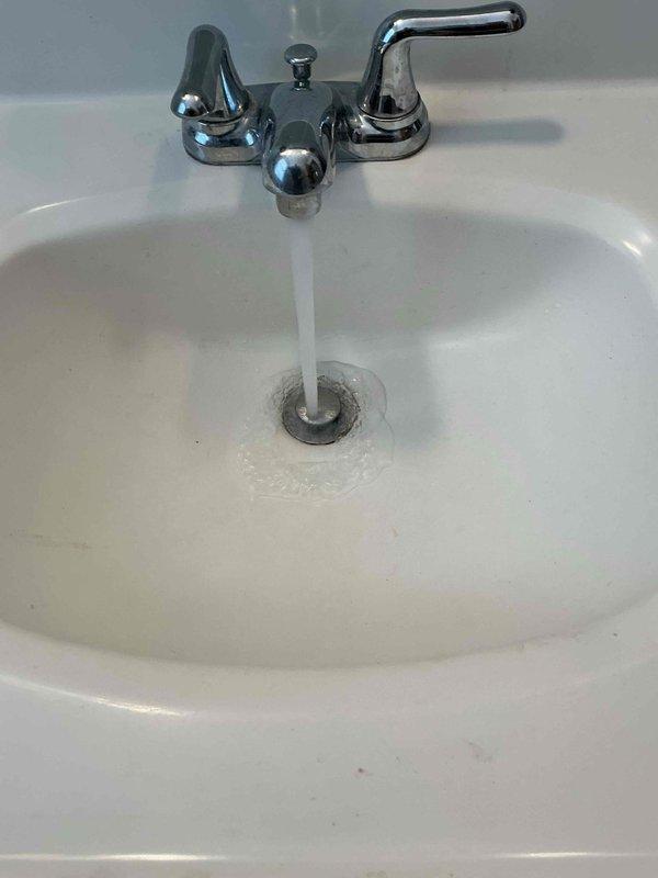 Responded to a service call for multiple plumbing issues. Successfully rebuilt the hot side of the kitchen sink faucet to restore proper functionality. Cleared slow-draining bathroom tub and sink using appropriate drain cleaning techniques, restoring normal drainage to both fixtures. All systems were tested and confirmed to be operating correctly before completing the service.