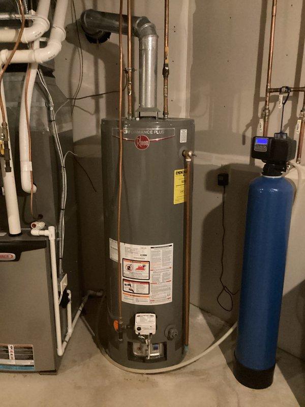 Diagnosed non-operational 50-gallon Performance Plus natural gas water heater with extinguished pilot light. Performed full inspection of unit and reignited pilot. Customer was advised on replacement options due to age and condition of current Rheem tank.