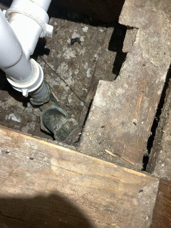 Responded to service call for a clogged bathroom tub drain. Upon inspection, accessed the crawl space to examine the PVC drain pipes and metal connection points showing signs of corrosion. Successfully cleared the clogged drain line, restoring proper drainage function to the tub.