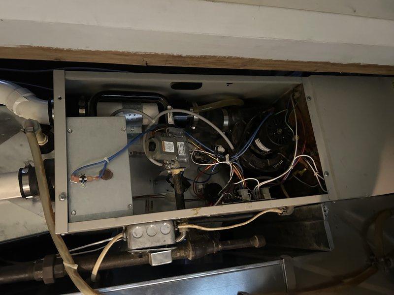 Responded to no heat call for a system with a limit code and non-functioning blower. Identified that the new blower motor installed last week had a burned out low speed winding due to incorrect capacitor installation (10 mfd vs. required 5 mfd). Replaced with correct 5 mfd capacitor and rewired motor to utilize medium speed winding as a temporary solution until replacement motor arrives.