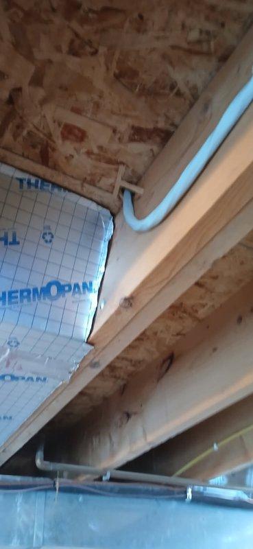 Responded to customer call regarding water leakage from cold air return. Upon inspection, determined issue is plumbing-related rather than HVAC-related. Observed water staining on wooden joists in unfinished basement/attic area. Confirmed with customer that plumber is scheduled to investigate suspected sources (dishwasher or toilet) tomorrow.