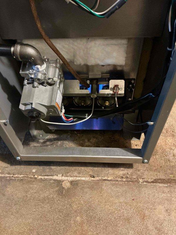 Responded to no heat complaint on recently installed Lennox boiler. Upon inspection, observed water dripping from chimney pipe line. Opened unit to examine gas valve assembly and insulation. Performed system operation test and restored proper heating function.