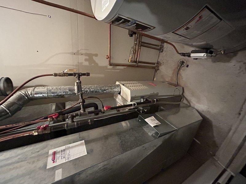 Responded to no heat issue on 20+ year old furnace. Diagnosed loose mounting bolt on inducer head causing loud vibration. Re-secured the bolt, restoring proper operation and heat function. Customer inquired about equipment replacement options; scheduled follow-up with service advisor.